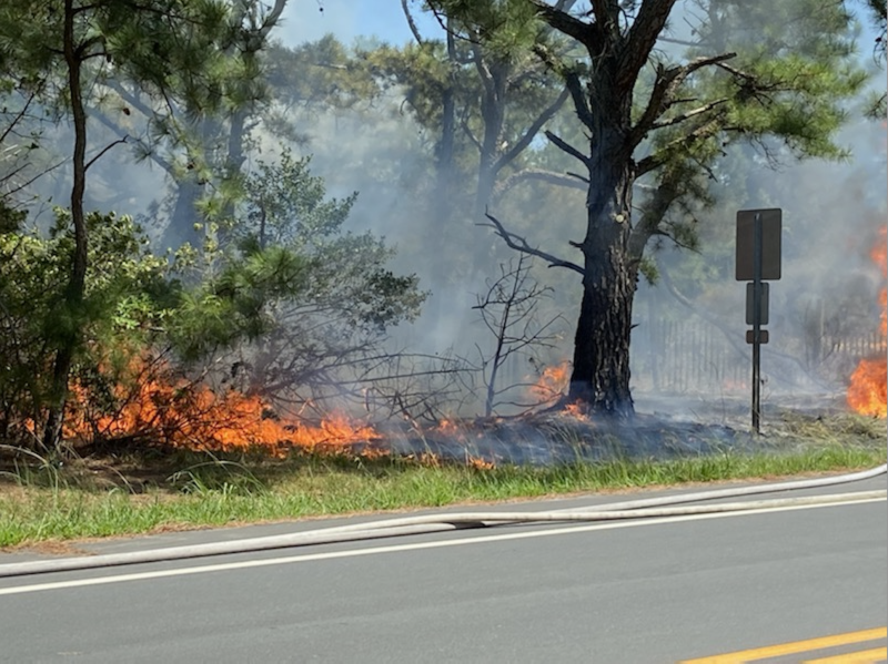 A problem with an underground electric line caused a brush fire in 2022 on Ocean Drive near Henlopen Acres. State fire officials warn that weather patterns including drought conditions and high winds in recent months have increased the risk of even small fires getting out of control and causing major damages. SUBMITTED PHOTO